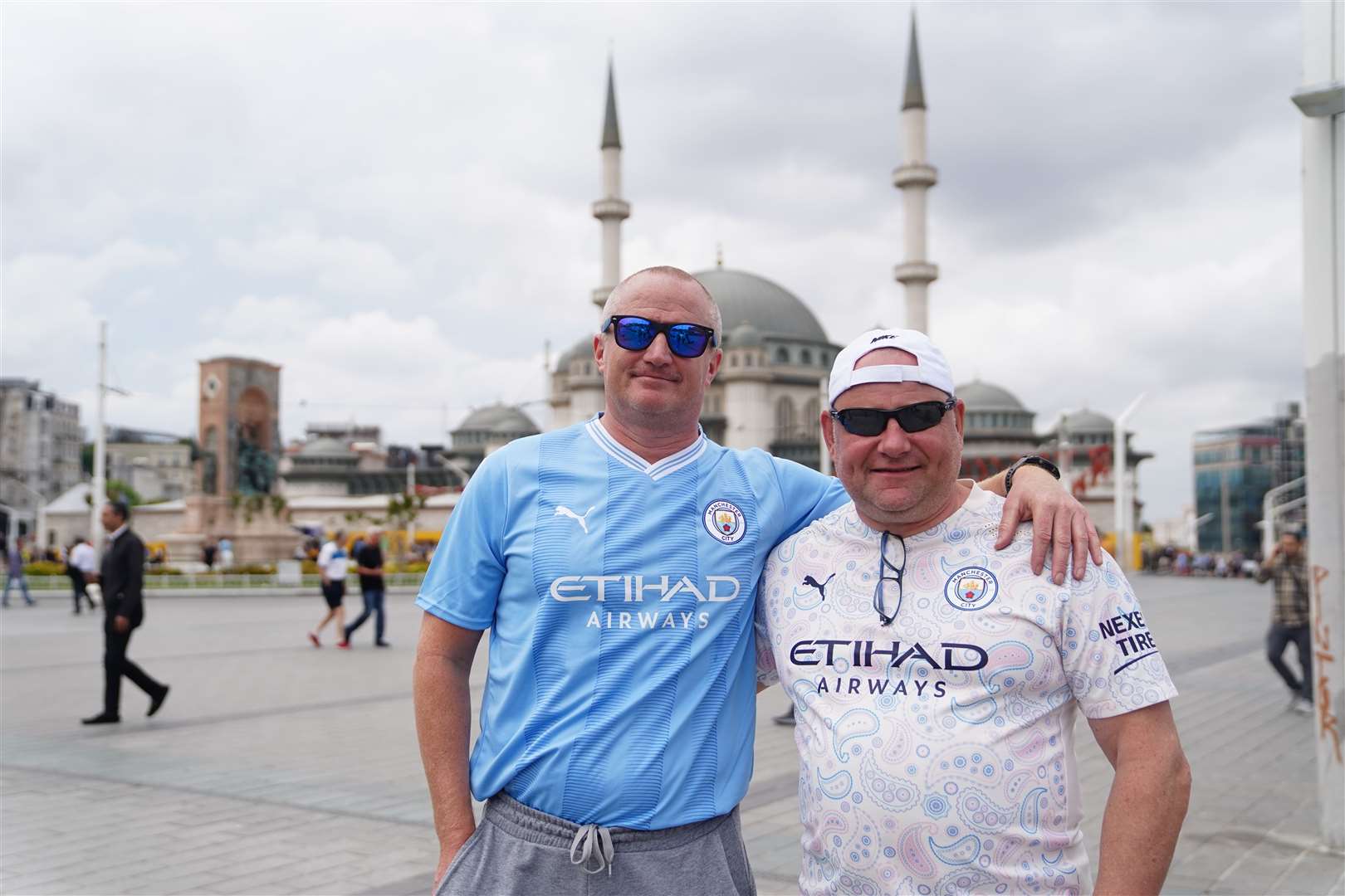 Manchester City fans Brian Tilley and Tim Jones in Taksim Square, Istanbul (James Manning/PA)