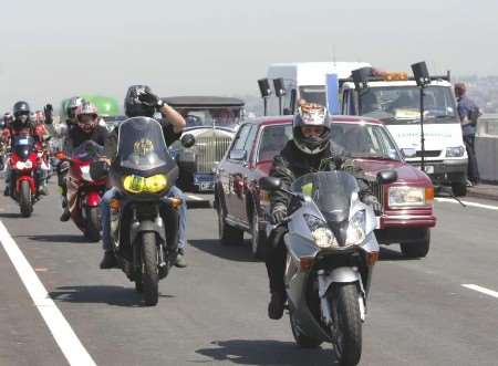 HISTORY IN THE MAKING: The first vehicles to cross the bridge Picture: ANDY PAYTON