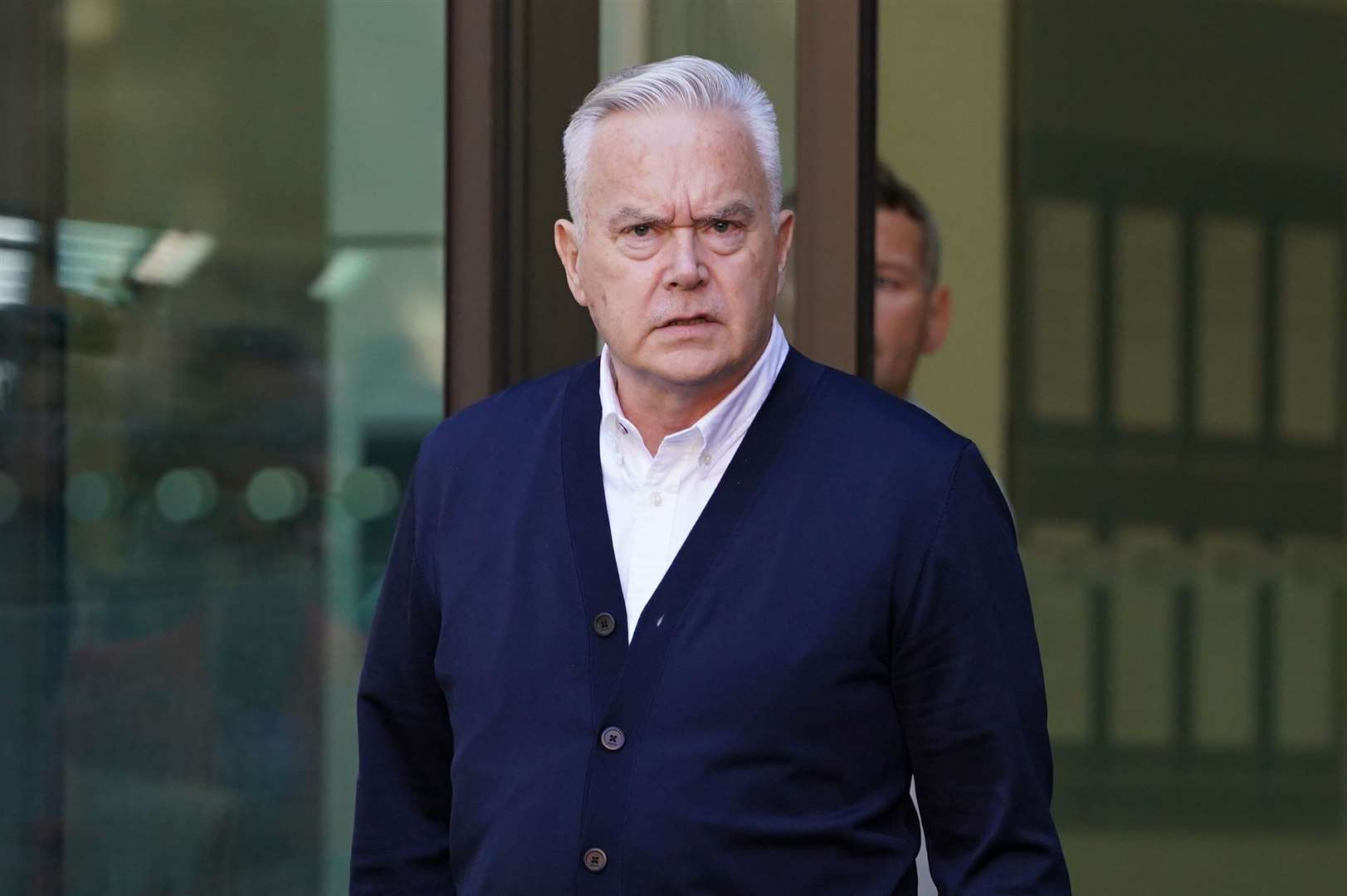 Former BBC broadcaster Huw Edwards leaves Westminster Magistrates’ Court (Lucy North/PA)