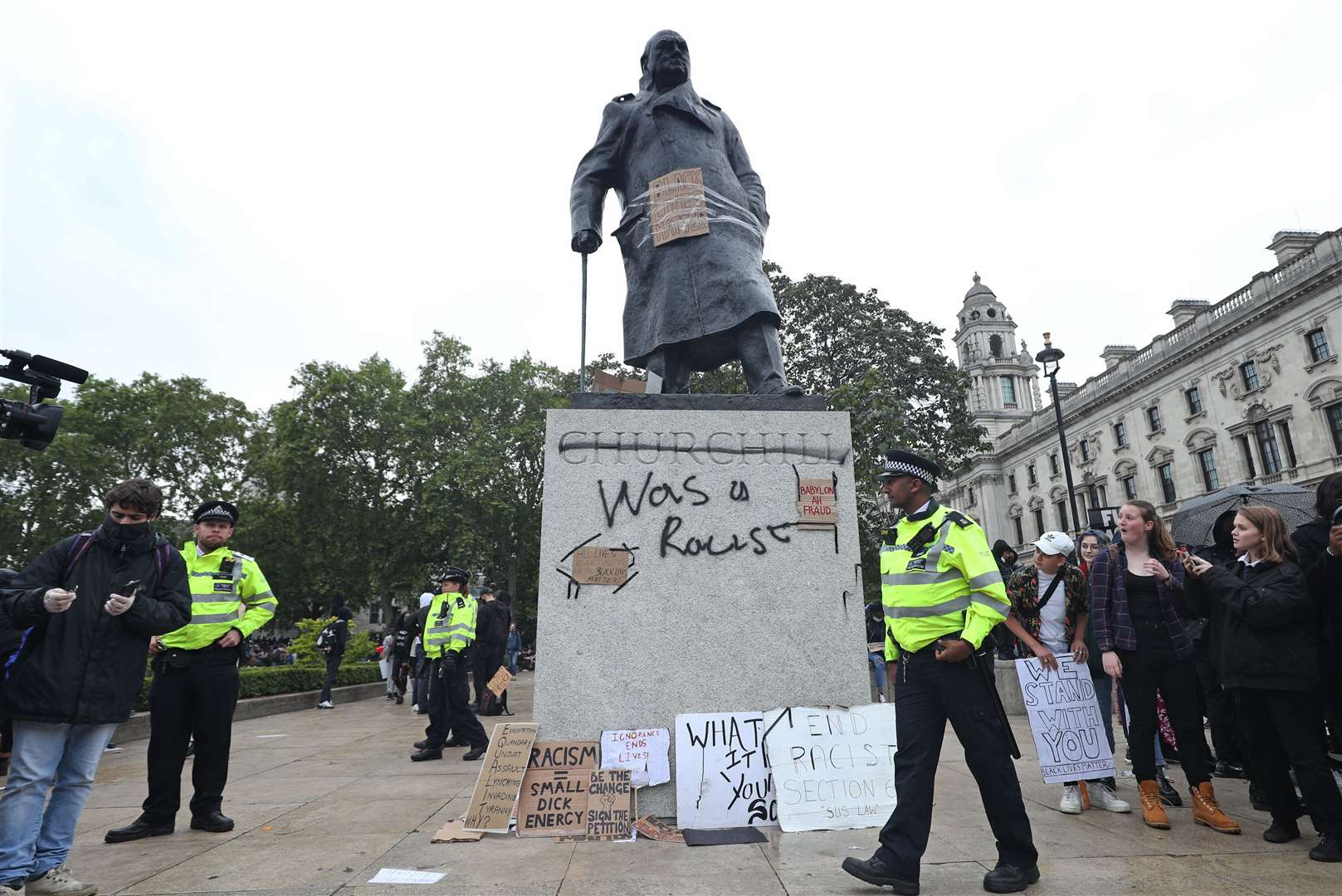 Graffiti on the Winston Churchill statue (Yui Mok/PA)