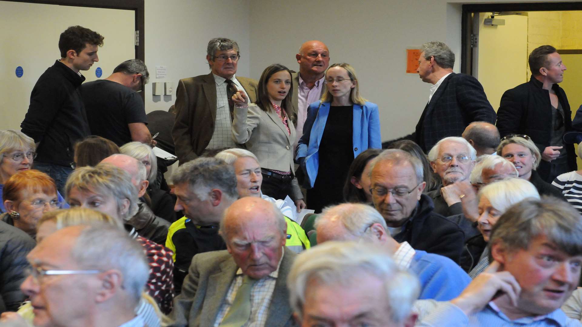 Helen Whately with Cllrs Richard Thick, Martin Round and Jenny Whittle, with some of the audience