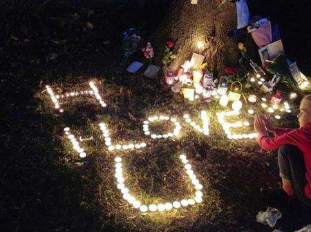 Candles are lit in Central Park, Dartford for teenager Hannah Coan who was hit by a car