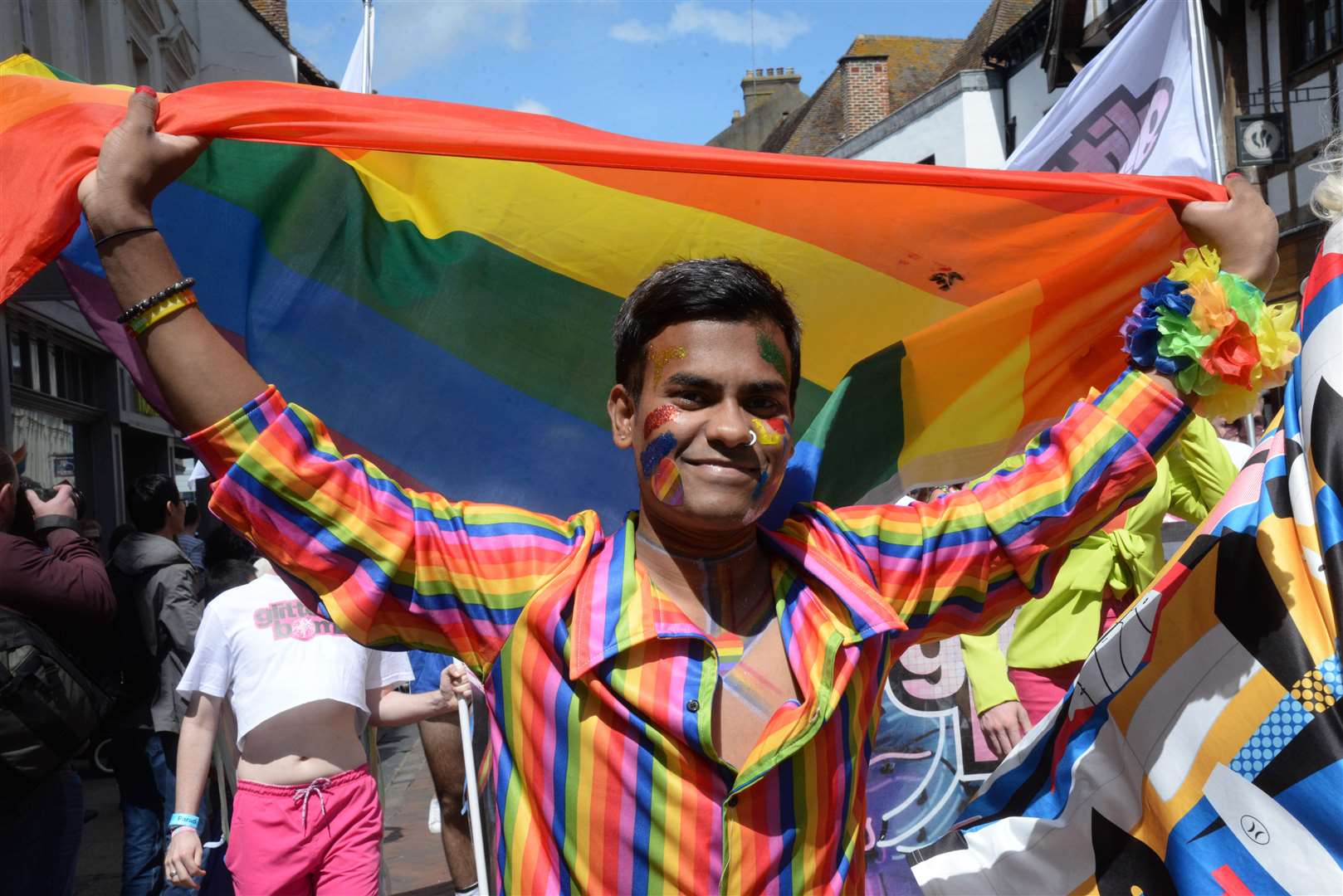A man wearing the rainbow flag makes his way through Canterbury at Pride last year