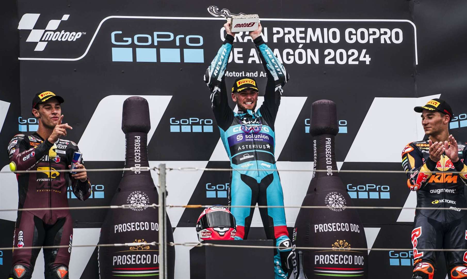 Dover's Aspar Team racer Jake Dixon celebrates on the podium after winning the Moto2 race at Aragon. Picture: Aspar Team