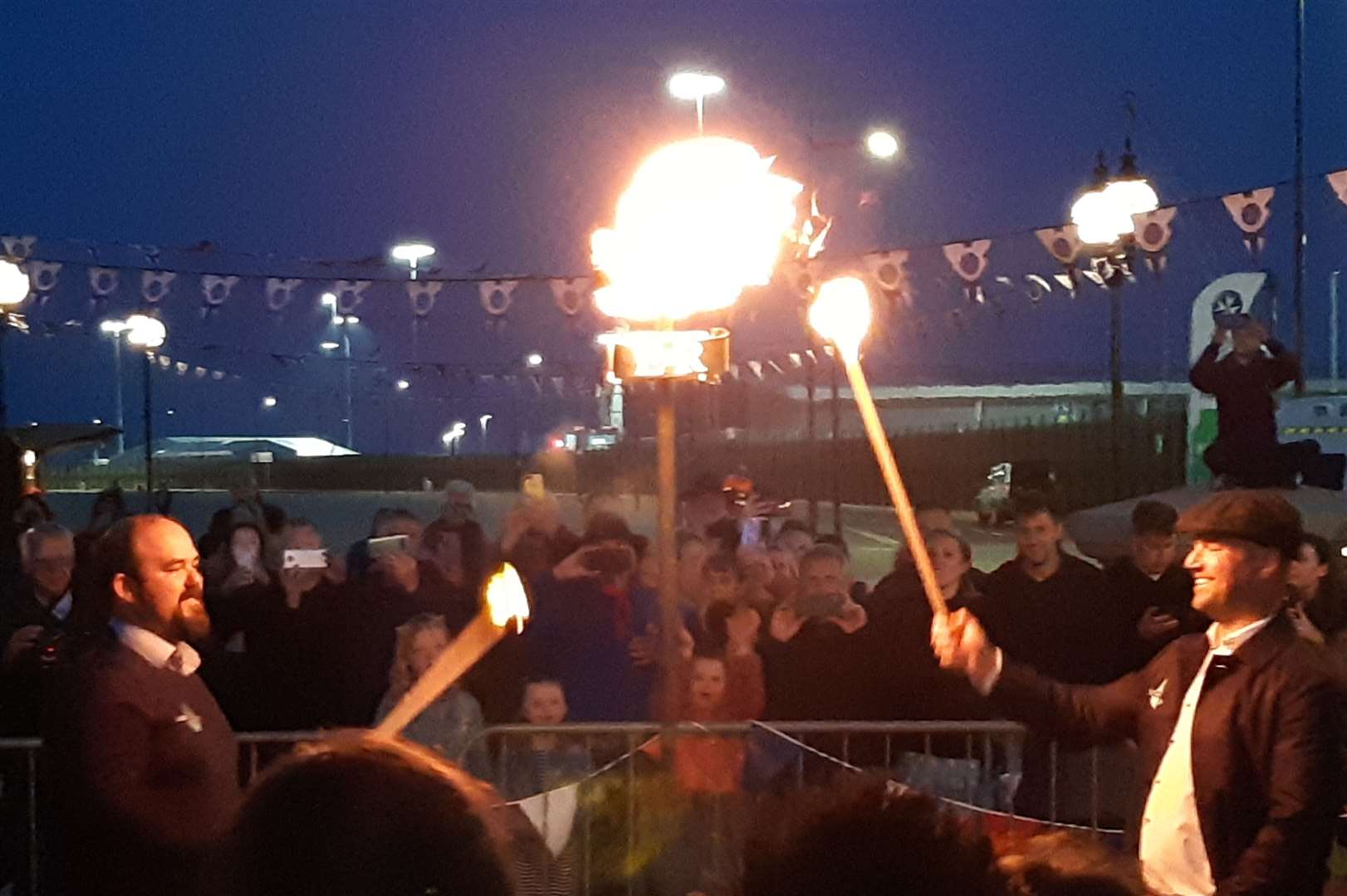 The moment the beacon was lit tonight at Dover seafront. Picture: Sam Lennon KMG