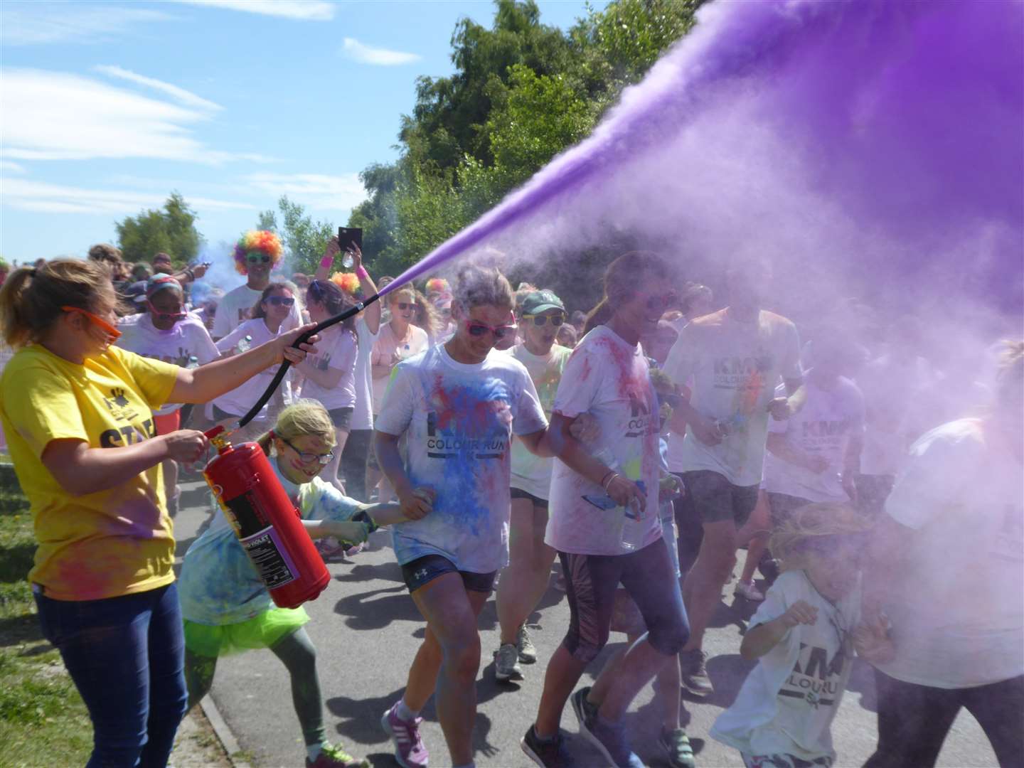 Colour run participants will be covered in coloured powder at colour stations around the 5K route. (1728180)