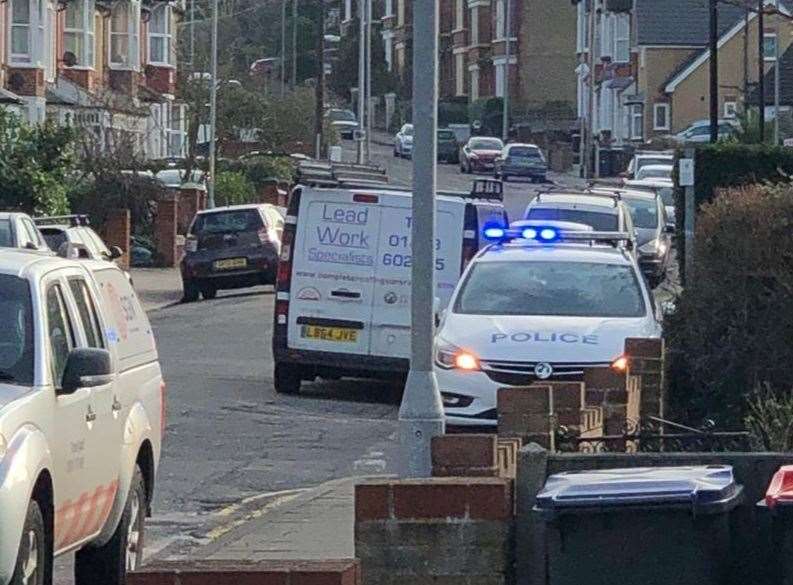 Police at the junction of Mickleburgh Hill and Douglas Road, which was shut off