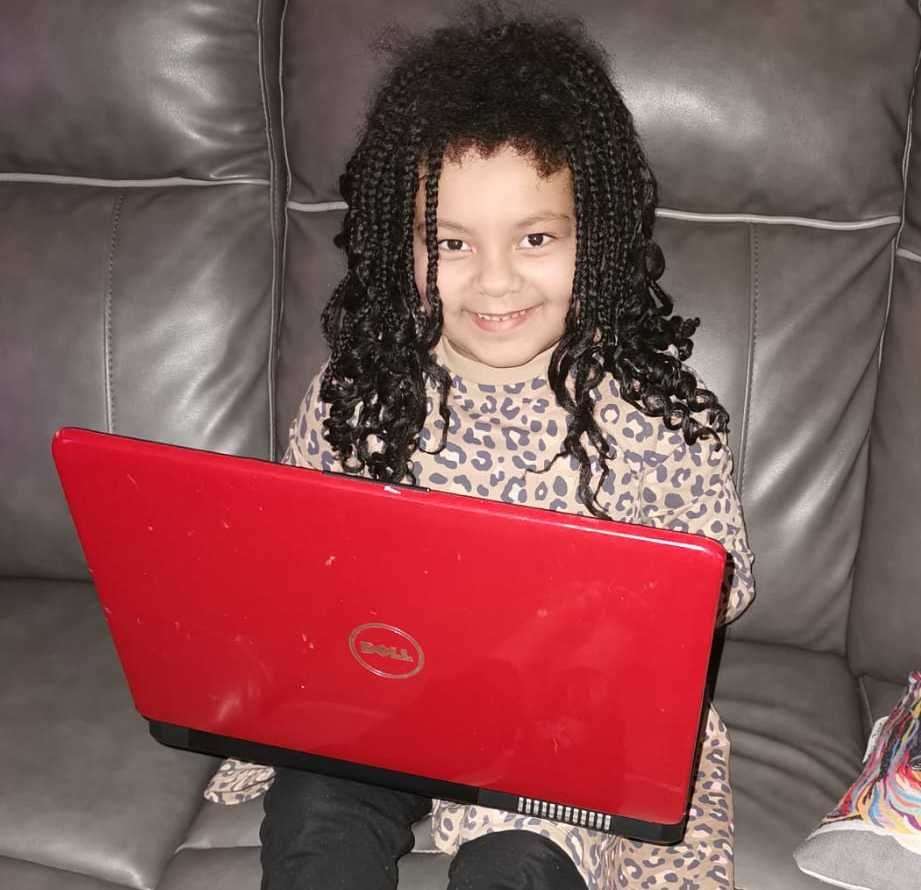 Jane Campbell's daughter Esmai, six, who received a laptop from Charlotte Cornell's Top Up to Teach scheme. Picture: Jane Campbell