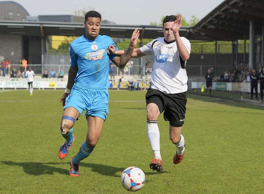 Danny Harris challenges Tamworth's Claudiu Hoban Picture: Andy Payton