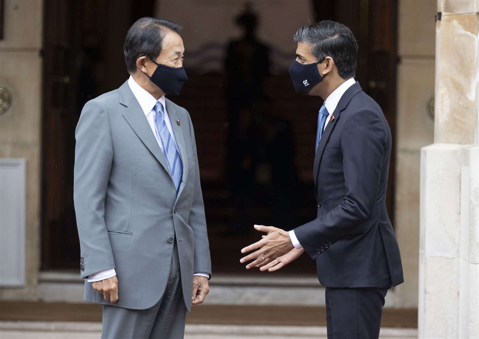 Rishi Sunak welcomes Japan’s finance minister, Taro Aso, to the G7 finance ministers meeting (Stefan Rousseau/PA)