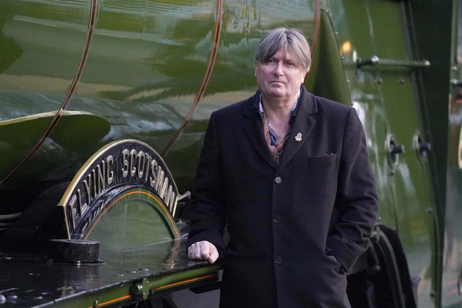 Poet Laureate Simon Armitage rode the locomotive to find inspiration for his poem (Andrew Milligan/PA)