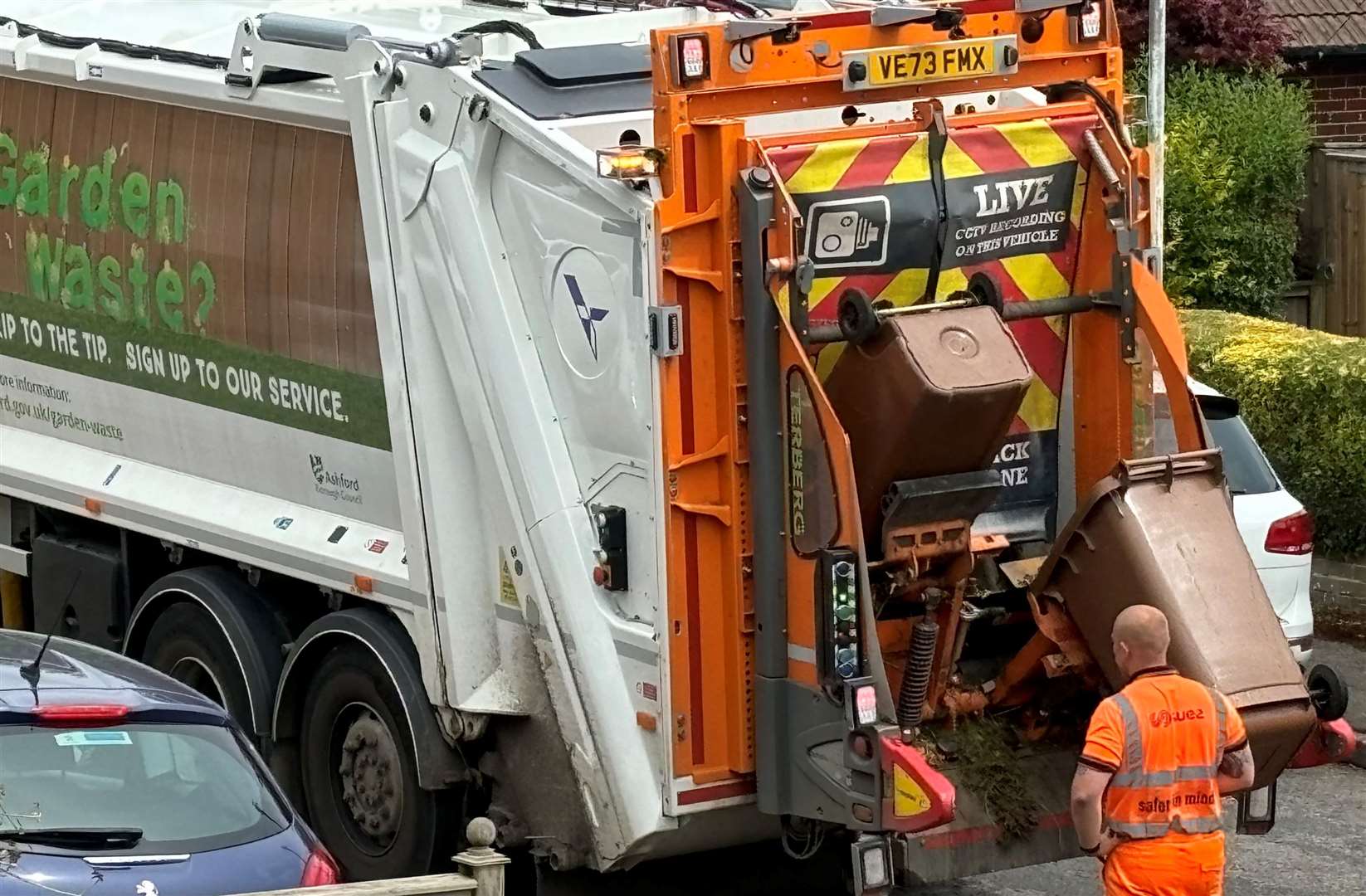 Suez workers collecting garden waste in Ashford