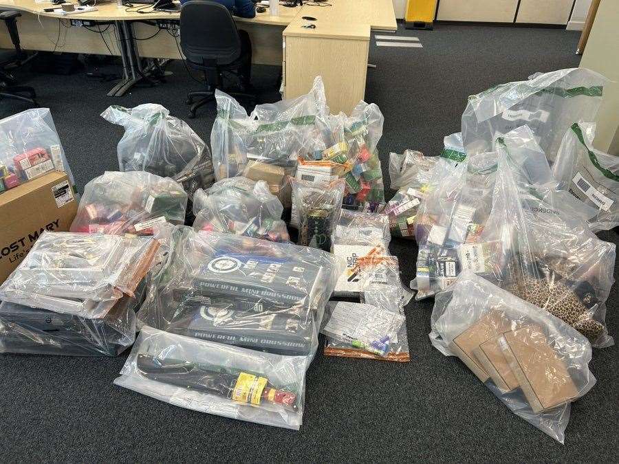 A huge number of vapes, weapons and other suspected illegal items were seized at two Chatham businesses. Picture: Kent Police Medway