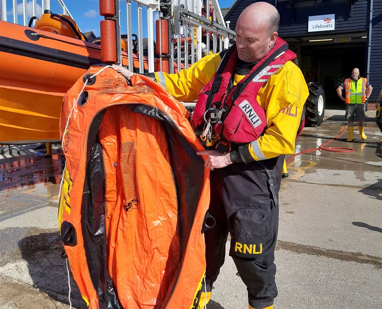 Andy Williams with the 10-year-old girl's inflatable boat which was rescued in Reculver. Picture: RNLI Whitstable