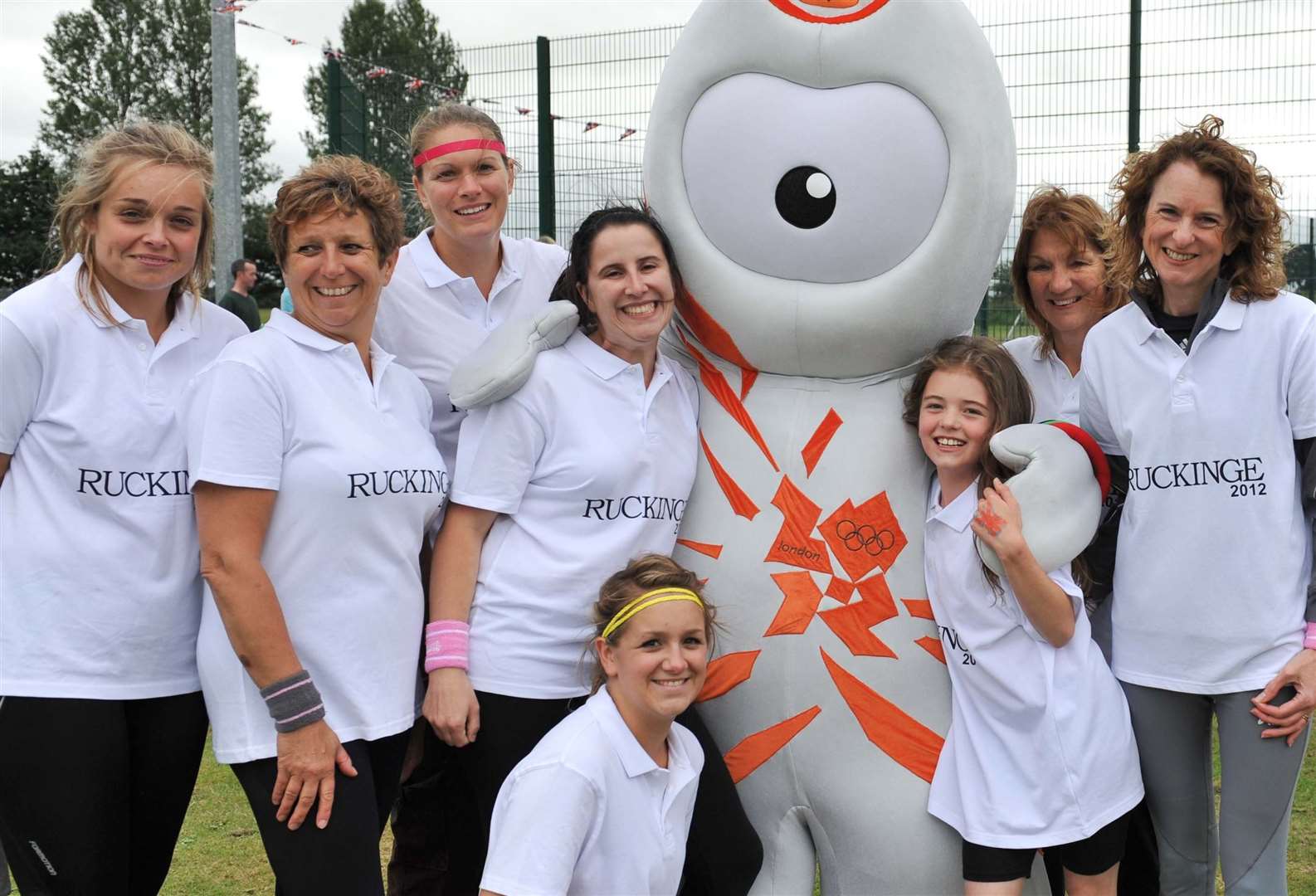 The Ruckinge netball team with Olympic mascot Wenlock