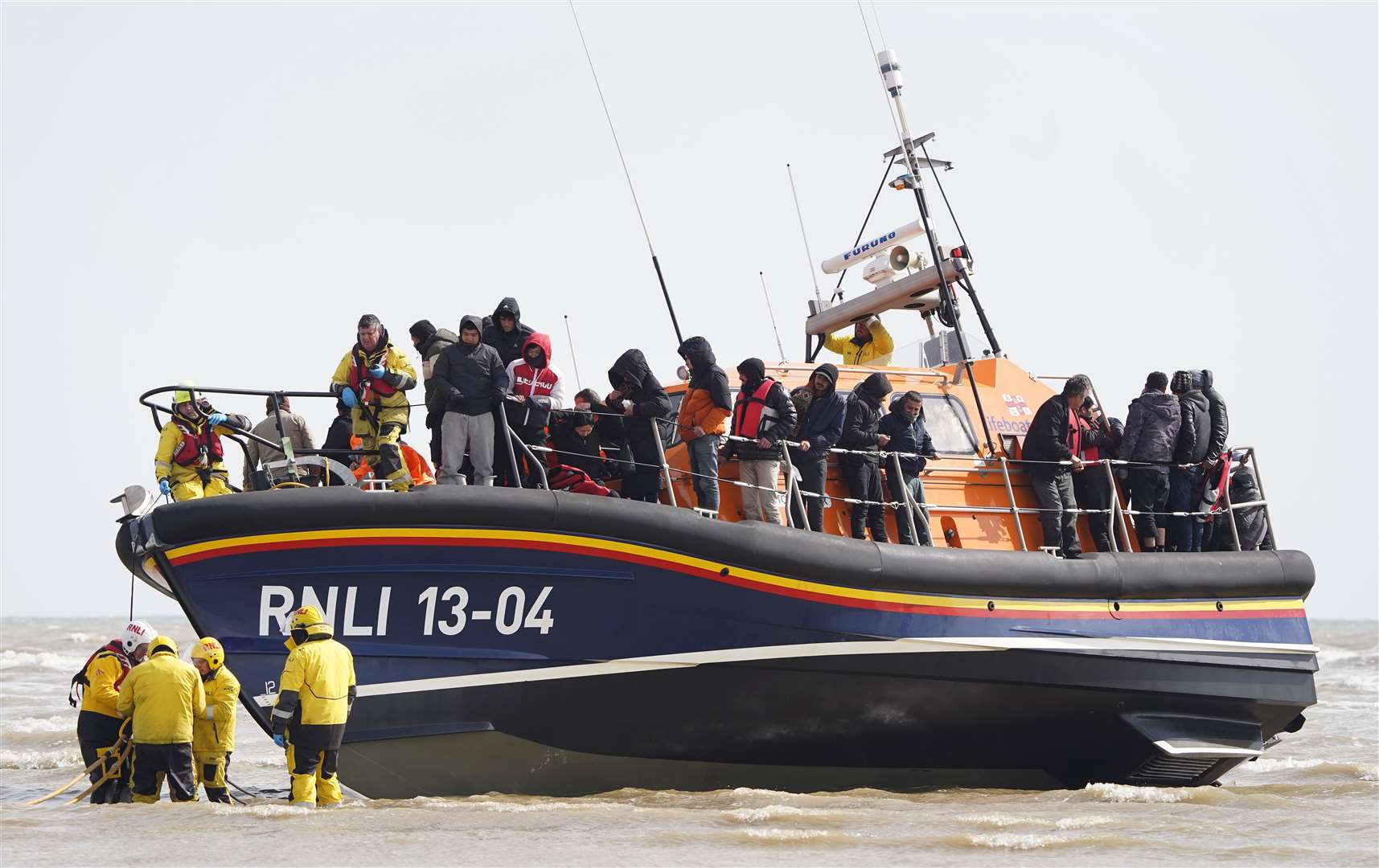 A group of people thought to be migrants are brought in to Dungeness, Kent (Gareth Fuller/PA)