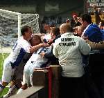 The Gillingham players celebrate Andy Hessenthaler's goal with the travelling support. Picture: BARRY GOODWIN