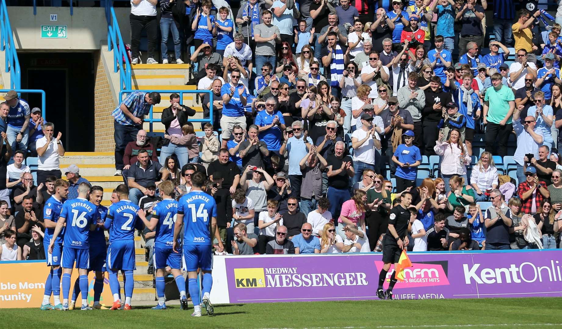 Gillingham and the fans celebrate a first-half equaliser