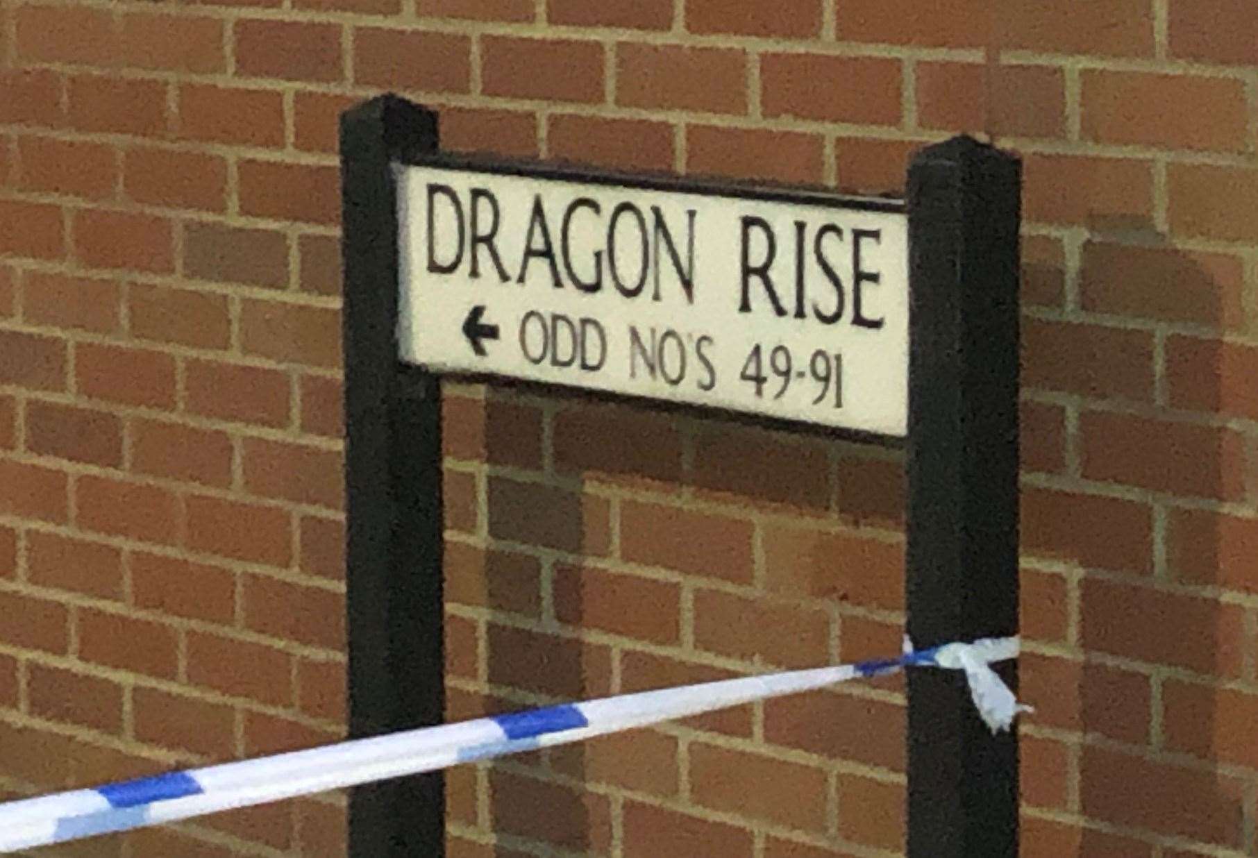 Police tape around the street sign for Dragon Rise in Norton Fitzwarren (Tess De La Mare/PA)