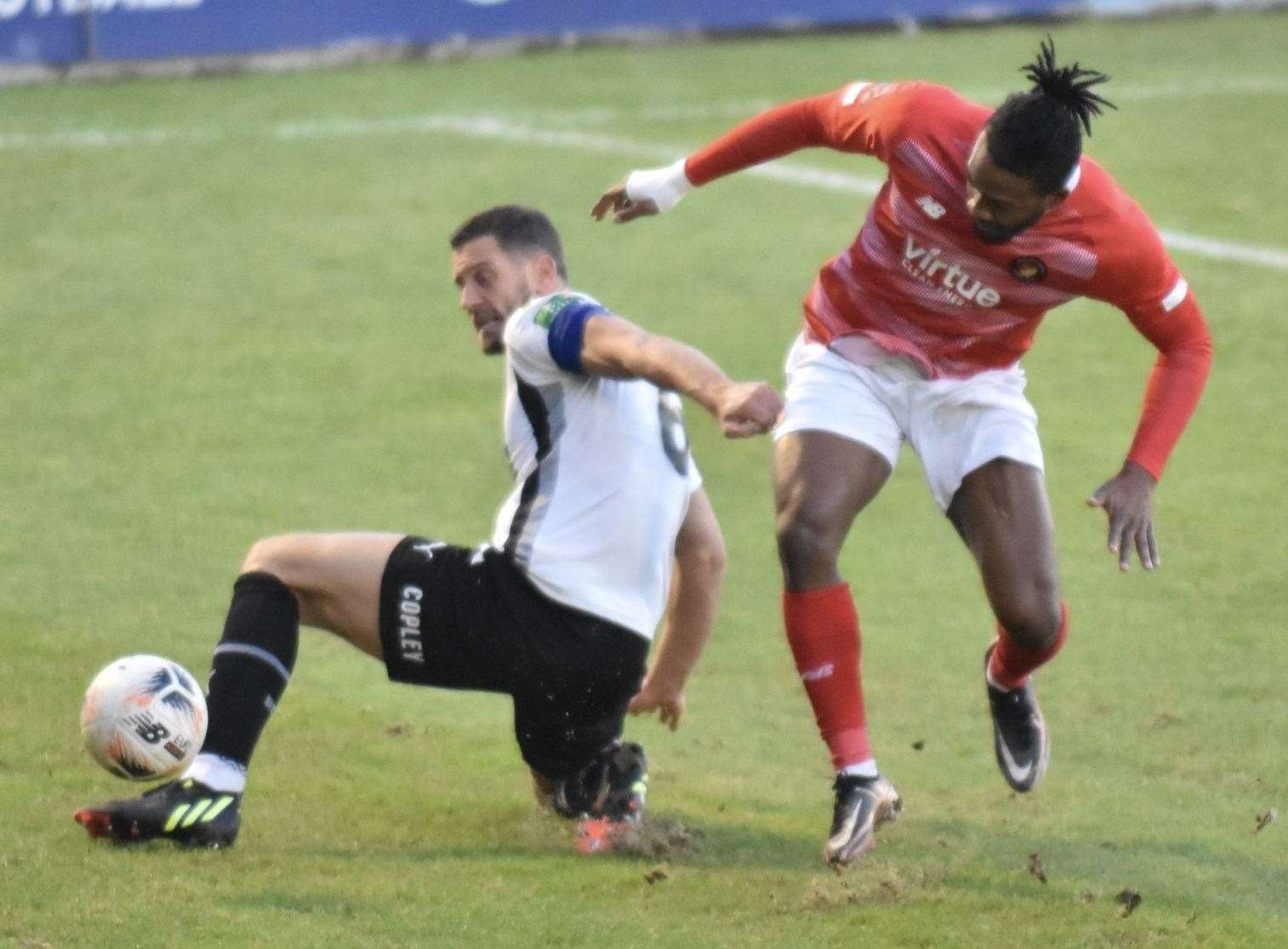 Ebbsfleet's Dominic Poleon competes with Dartford captain Tom Bonner. Picture: Ed Miller/EUFC