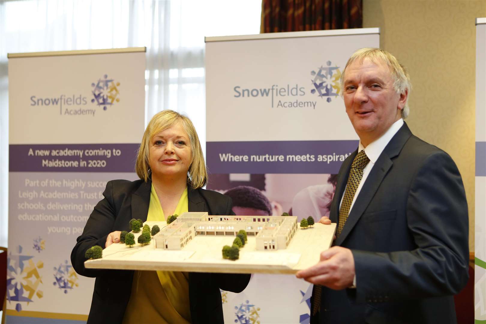 Dee Pickerill, the principal designate at Snowfields Academy, and Neil Willis, deputy CEO at Leigh Academies Trust with a model of the new schools