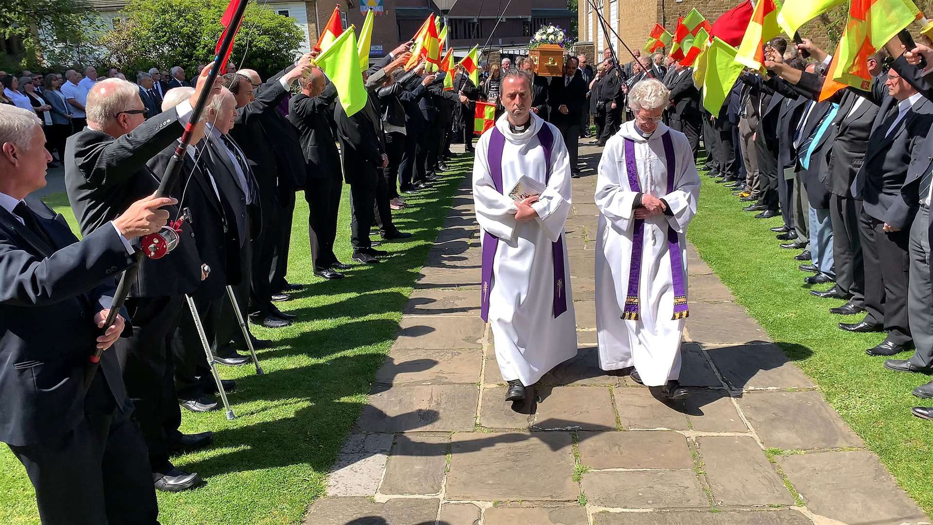 Referees and fishermen held a guard of honour for the funeral of Graham East (10522024)