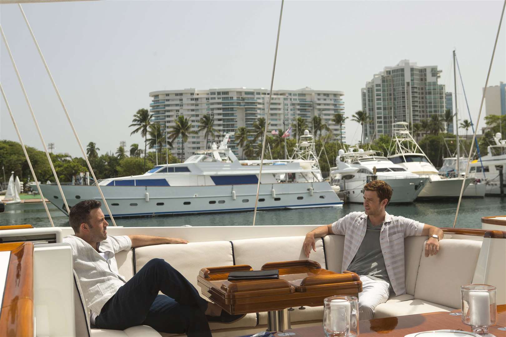 Ben Affleck as Ivan Block and Justin Timberlake as Richie Furst, in Runner Runner. Picture: PA Photo/Fox UK.