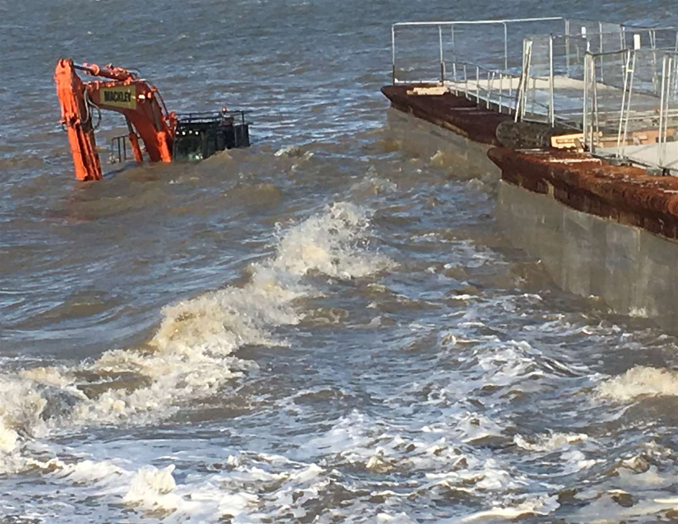 All at sea: the drowned digger at Neptune's Jetty, Sheerness. Picture: Wayne Featherstone (7801772)