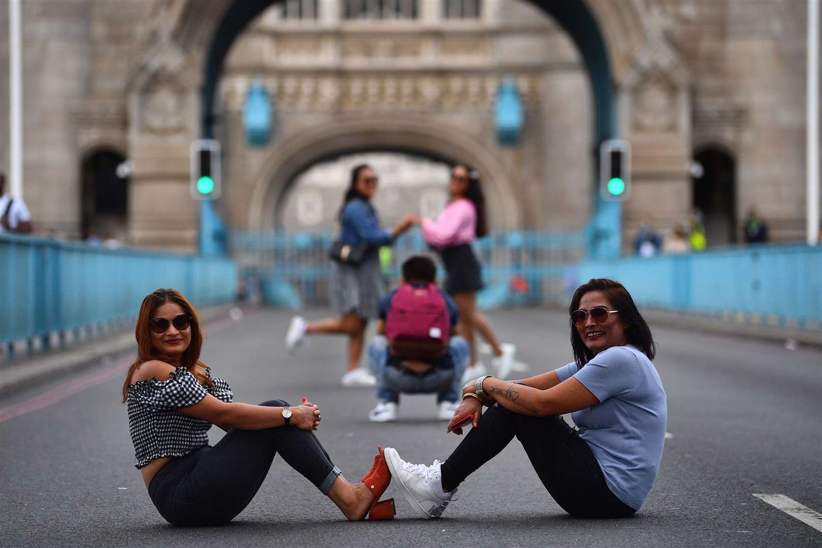 Tourists posed for photos on Tower Bridge while it was closed to vehicles (Victoria Jones/PA).