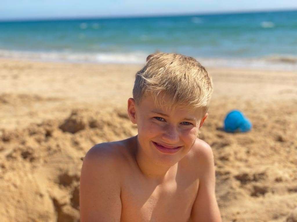 Alex tripped and fell backwards on to the metal part of a disposable barbecue which was buried in the sand at Camber Sands beach