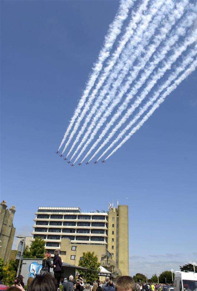 Crowds watch the Red Arrows fly over Folkestone