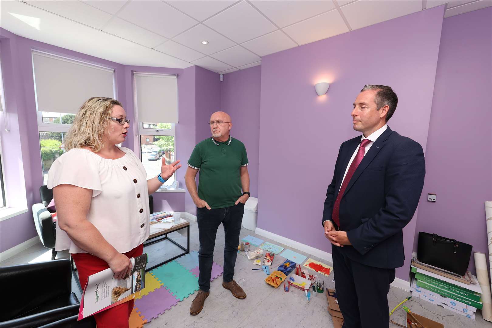 PIPS executive director Renee Quinn (left) and the Rev Bill Shaw with First Minister Paul Givan (Liam McBurney/PA)