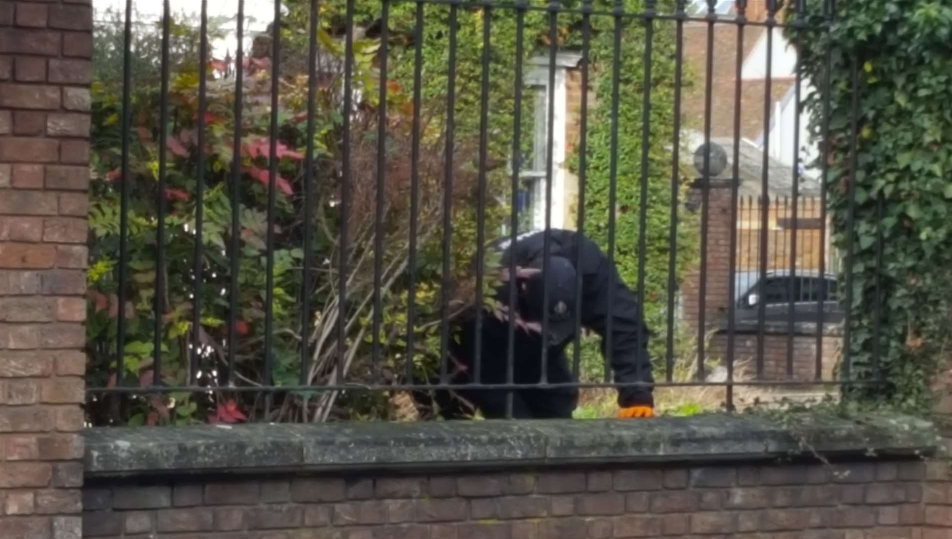Officers in Knightrider Street looking for evidence after the alleged murder of Welsey Adyinka