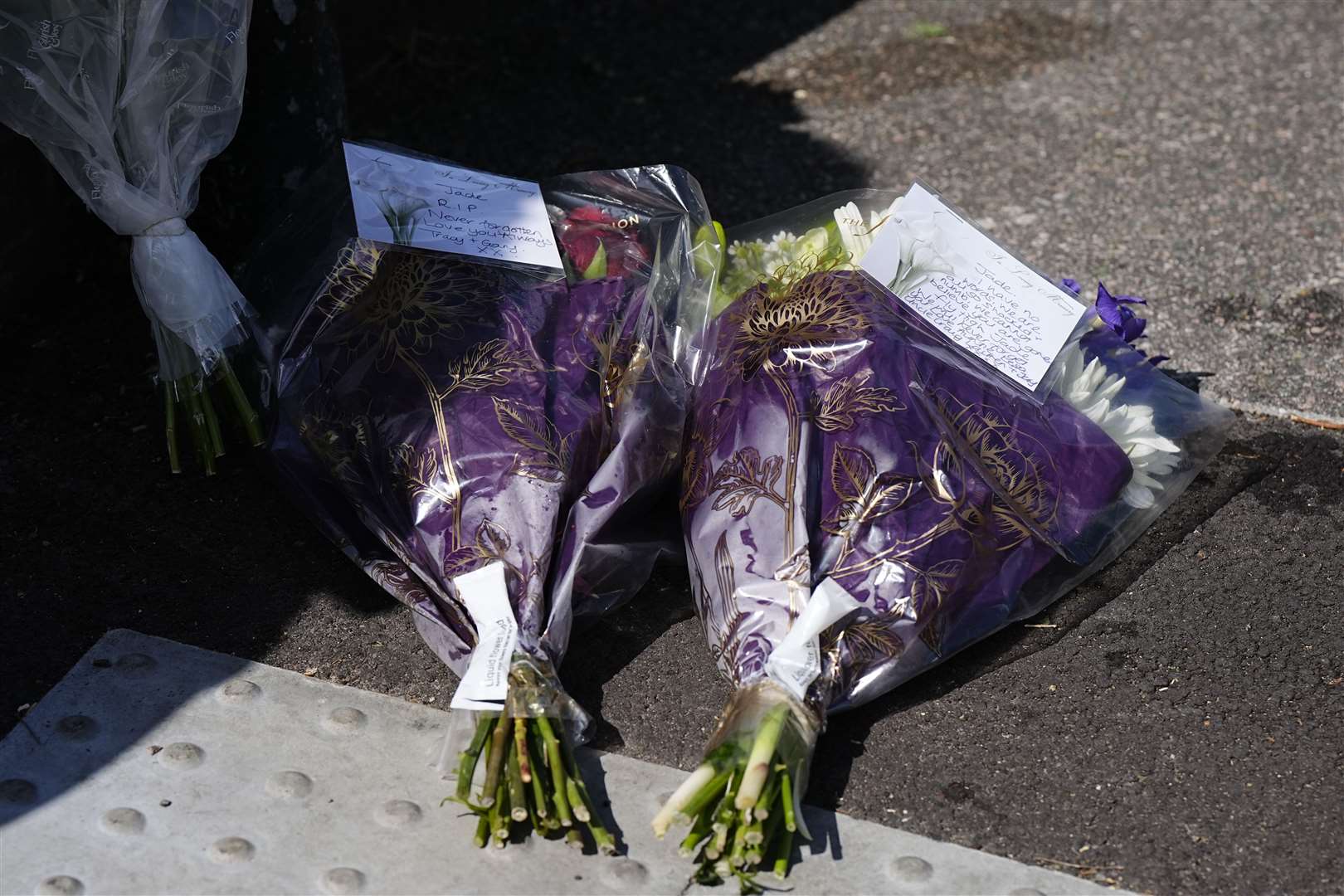 Floral tributes were left on Overbury Street, near the scene in Rushmore Road, Clapton (Aaron Chown/PA)