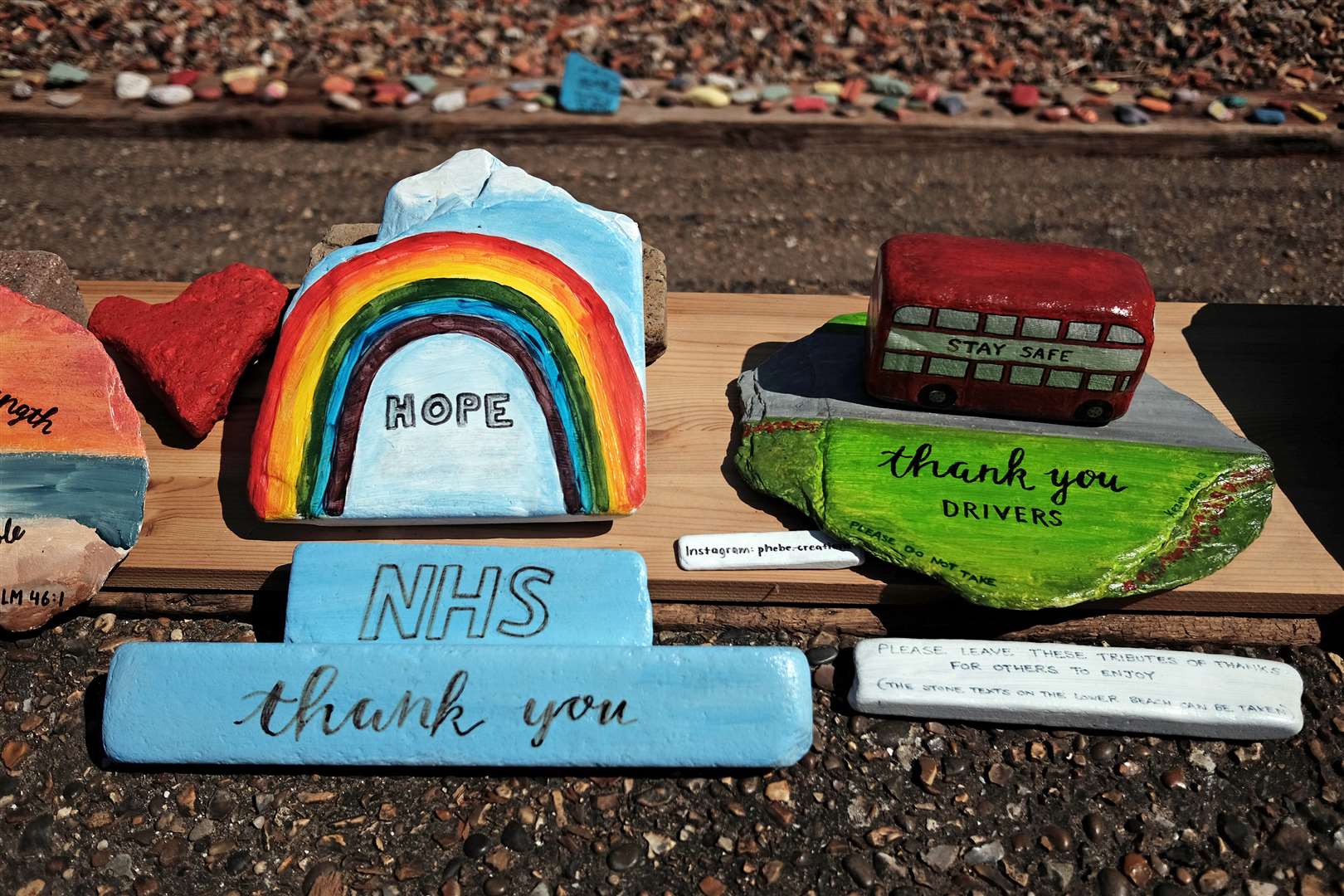 Tributes to NHS staff and bus drivers on display at Folly House Beach on the Isle of Dogs, east London (Yui Mok/PA)