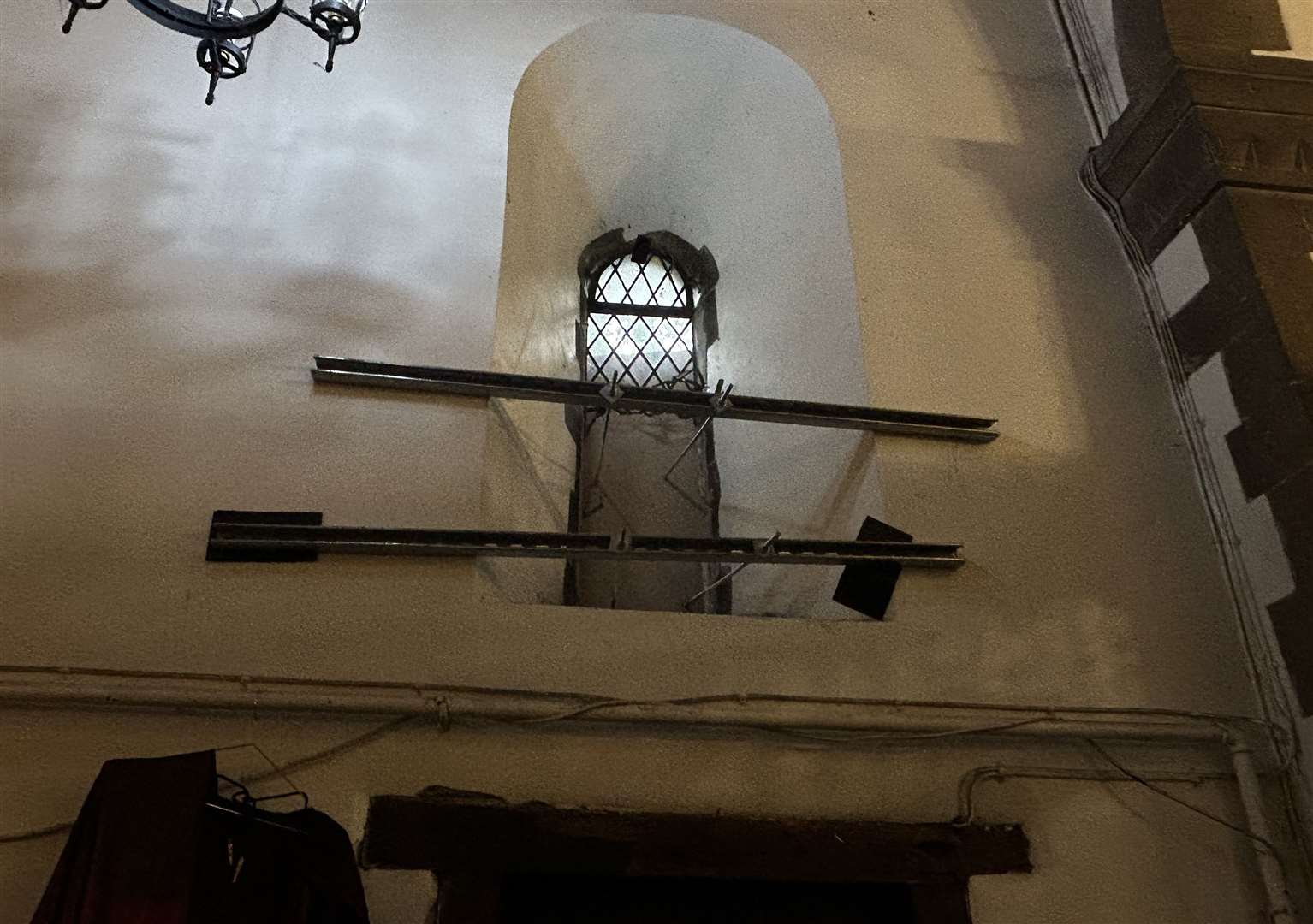 A smashed window at St Bartholomew's Hospital Chapel in Gundulph Road, Rochester