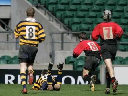 Oakham can't stop Joe Bedford going over for a try. Picture: GERRY McMANUS