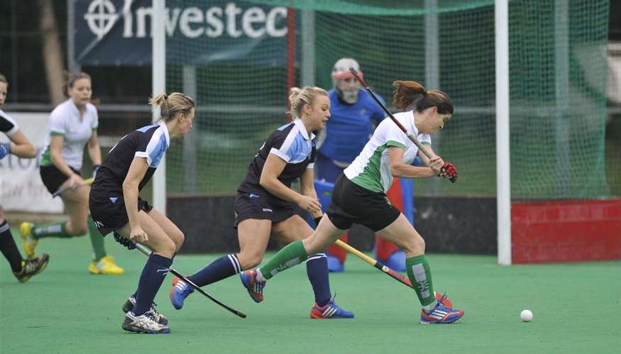 Player-coach Jen Wilson fires the ball goalward against Clifton