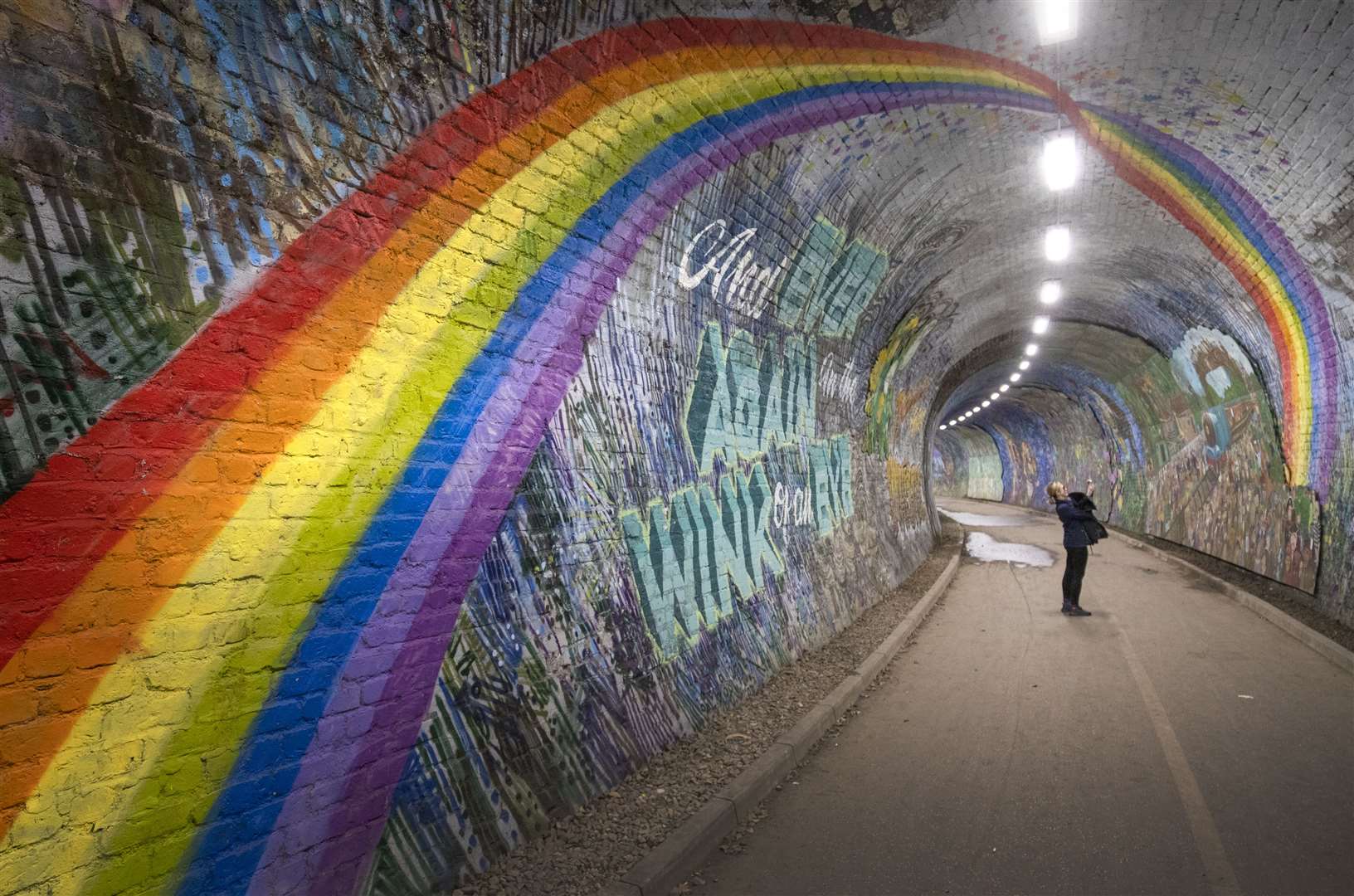 The rainbow has become a symbol of hope throughout the pandemic, adorning public spaces, being used in giant murals, while children up and down the country painted pictures of rainbows to display in their windows (Jane Barlow/PA)