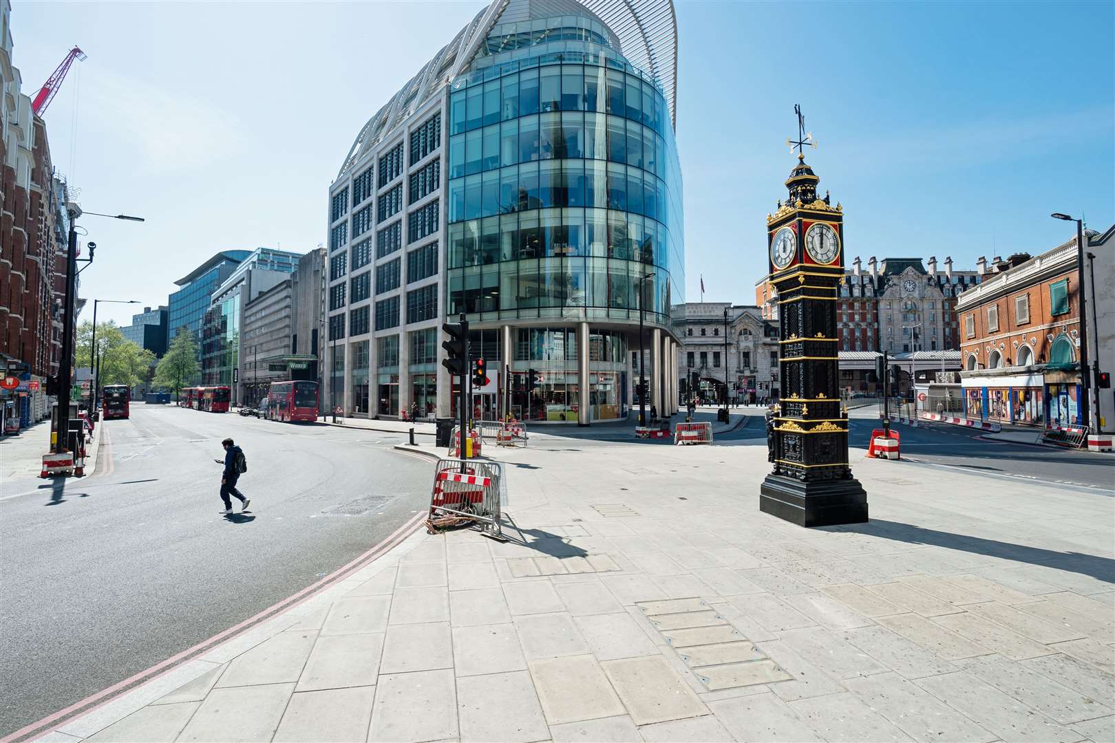 …50 days ago on April 22, fewer people were at the busy junction outside Victoria Station to check the time (Aaron Chown/PA)