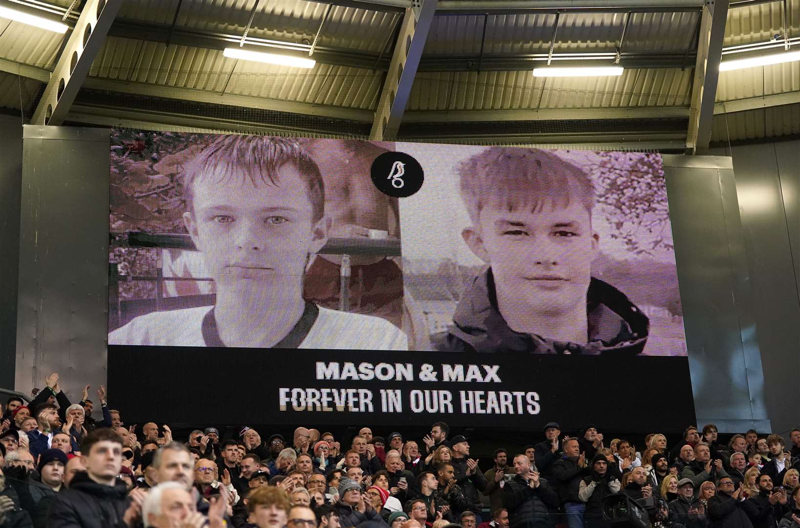 A tribute on the big screen for Mason Rist and Max Dixon during a Bristol City match at Ashton Gate (Bradley Collyer/PA)