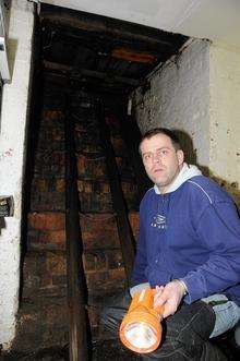 Fountain pub in Seabrook flooded. Landlord Clinton Parker in the cellar