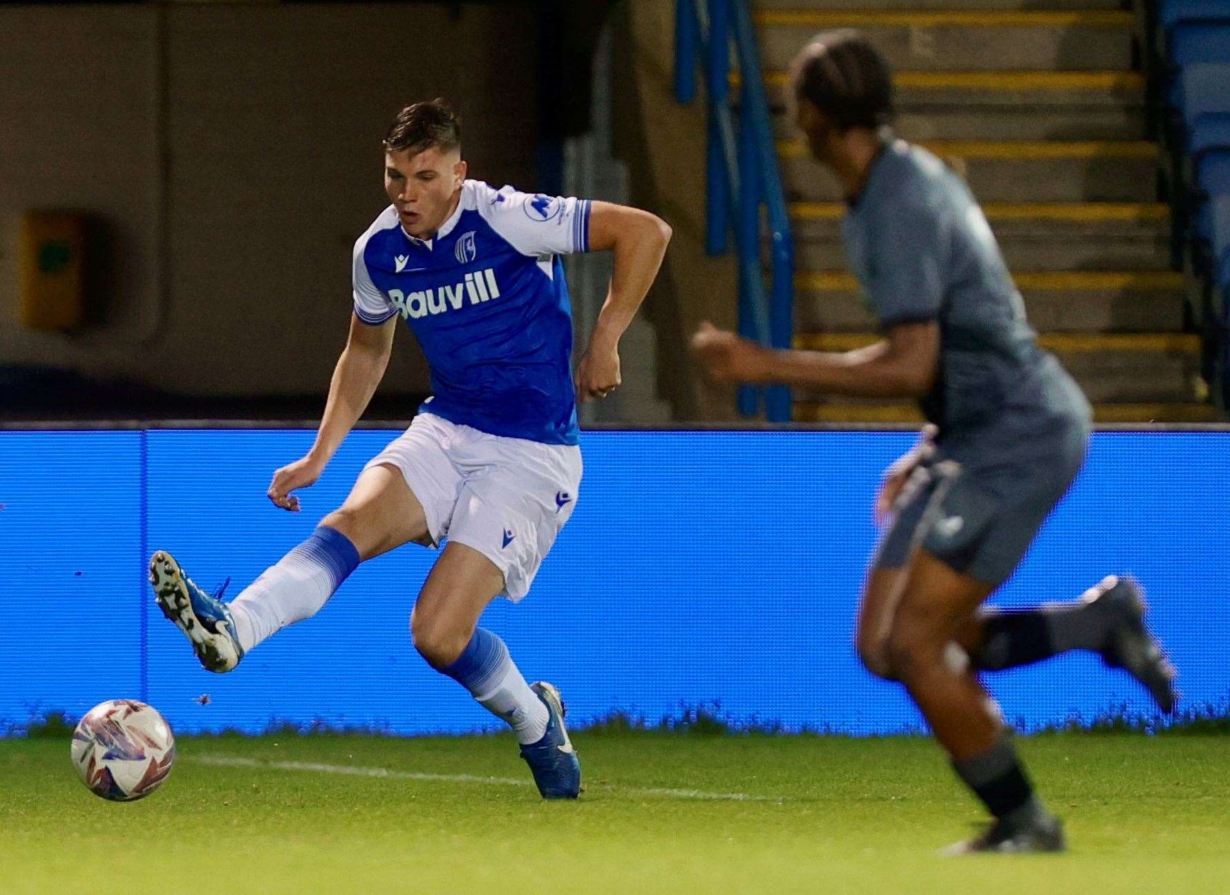 Logan Dobbs clears his lines for Gillingham on Monday night. Picture: @Julian_KPI/Gillingham FC