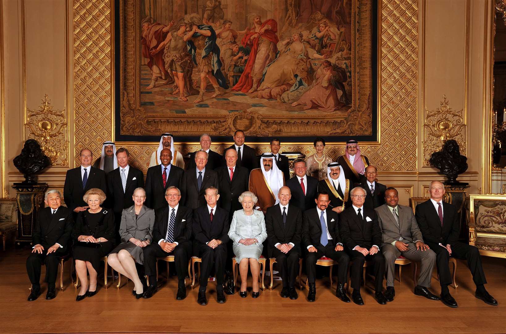 The then Queen with her Royal guests pose for a picture before her Sovereign Monarchs Jubilee lunch at, in the Grand reception room at Windsor Castle. The group photograph attendees are (front row, left to right) HM the Emperor of Japan, HM the Queen of the Netherlands, HM the Queen of Denmark, HM the King of the Hellenes, HM the King of Romania, HM Queen Elizabeth II of Great Britain, HM the King of Bulgarians, HM the Sultan of Brunei, HM the King of Sweden, HM the King of Swaziland, and HH the Prince Hans-Adam II of Liechtenstein John Stillwell/PA)