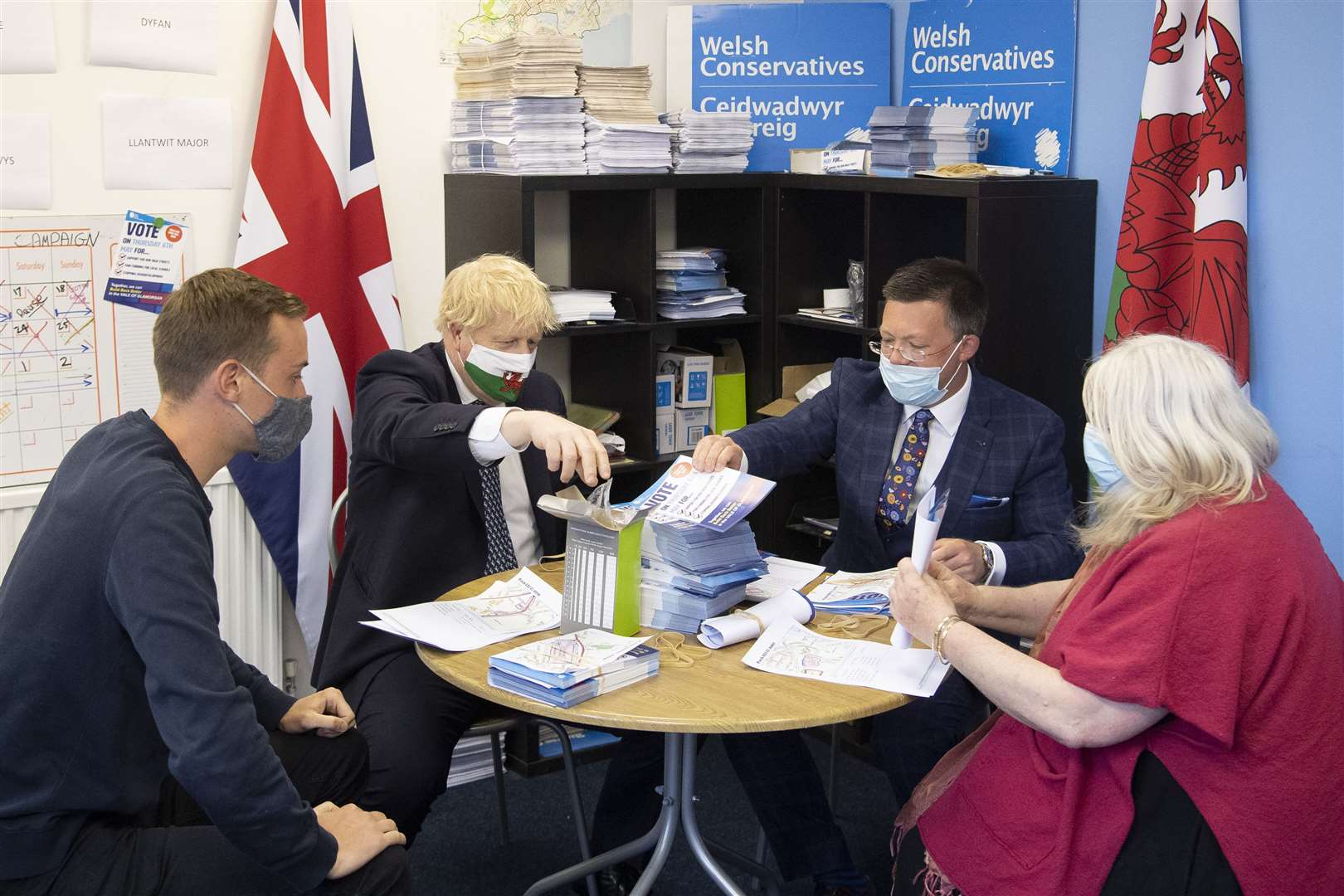 Prime Minister Boris Johnson alongside campaigner Joe Kidd (left), Conservative Party candidate Matt Smith and councillor Janice Charles (Matthew Horwood/PA)