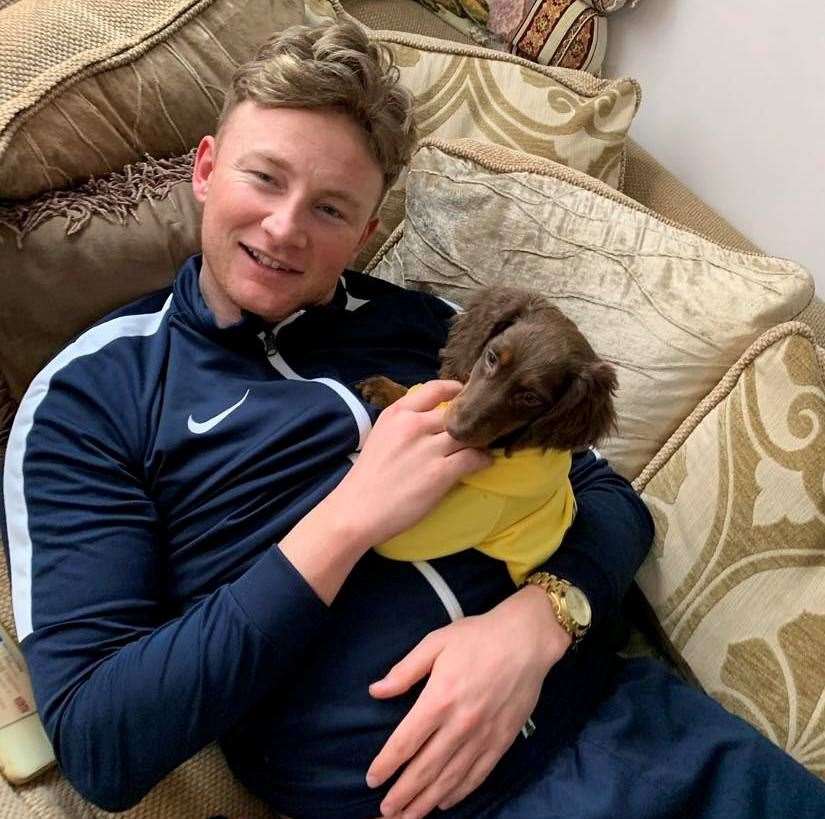 Frazer Allan with his sister’s dog Reggie