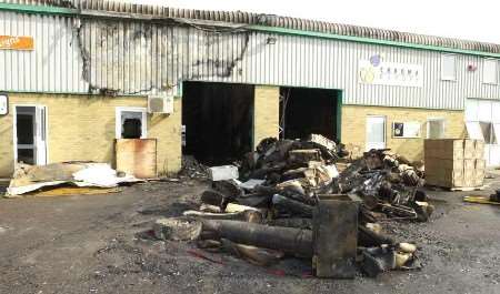 Acorn Carpets is still trading despite the damage. Picture: BARRY CRAYFORD