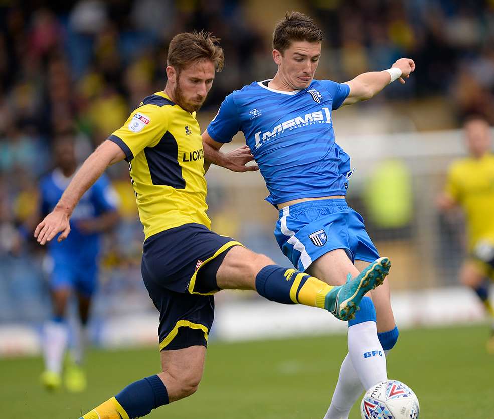 Alex Lacey battles for the ball Picture: Ady Kerry