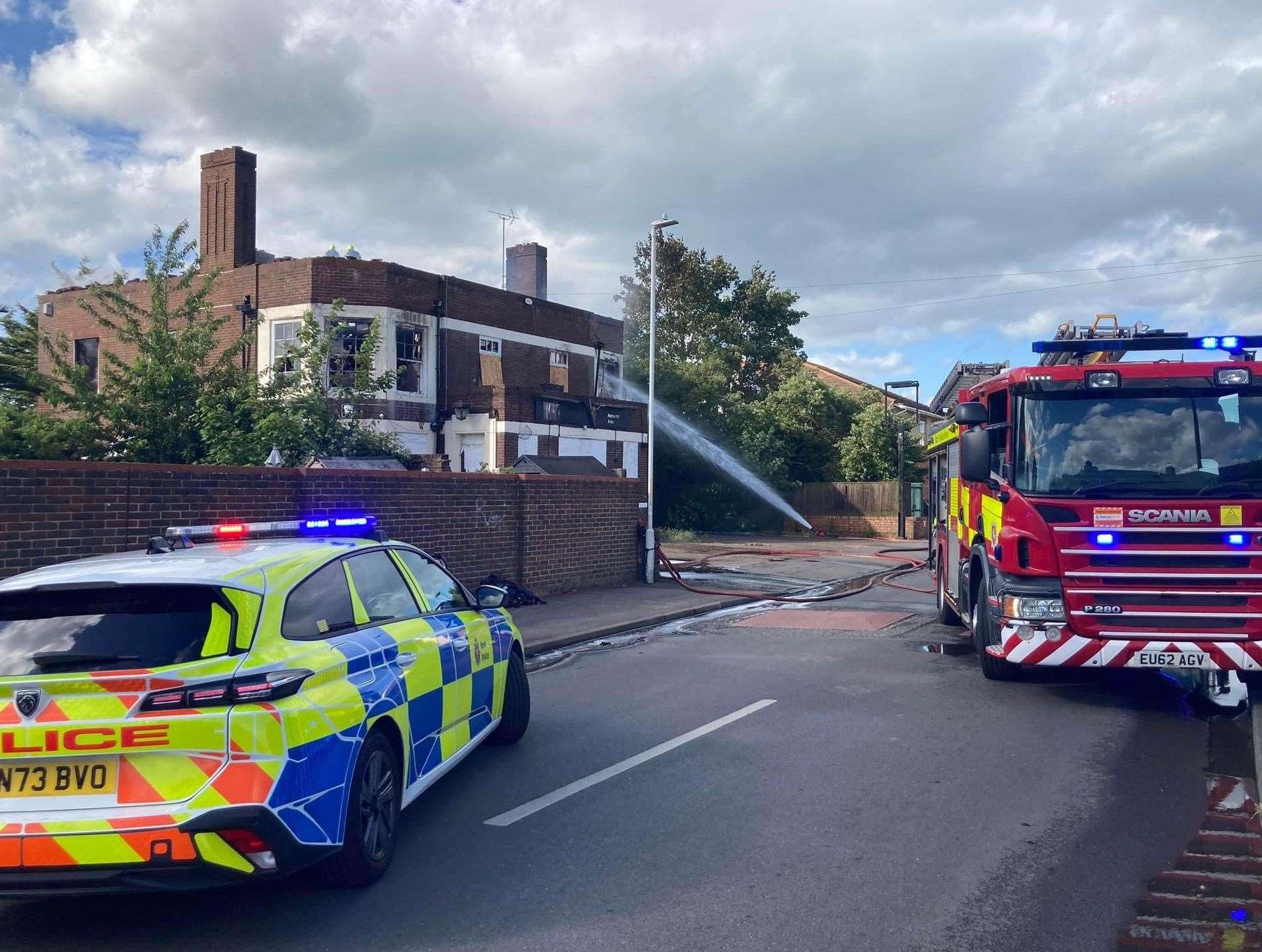 Firefighters tackling the blaze at the former Nore pub in St George's Avenue, Sheerness. Photo: John Nurden