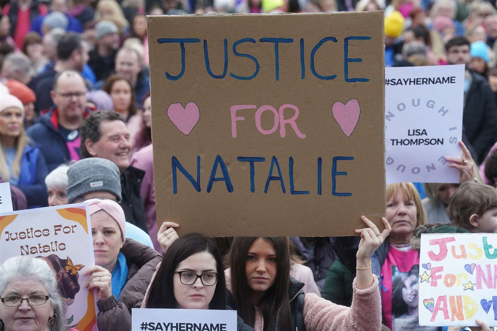 People at a vigil at Lurgan Park in Lurgan, Co Armagh in memory of murder victim Natalie McNally (Brian Lawless/PA)